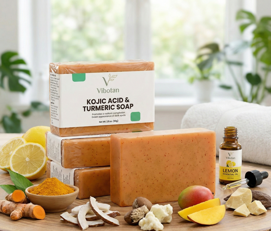 Vibotan Kojic Acid & Turmeric Soap with lemon, turmeric, and mango on a wooden surface.