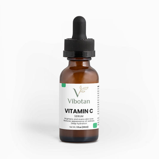Vitamin C serum bottle with dropper labeled 'VitalDaily' on a white background