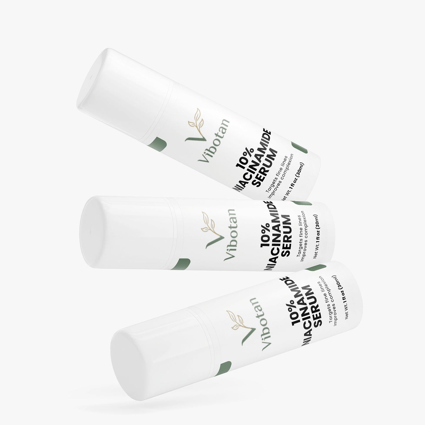 Three bottles of Vibotan 10% Niacinamide Serum on a white background