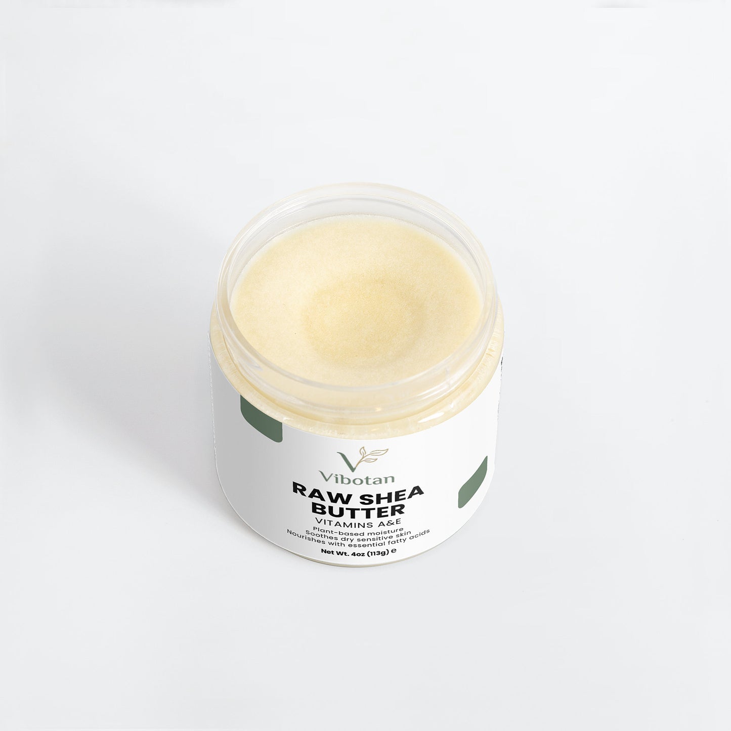Jar of Vibotan Raw Shea Butter on a white background