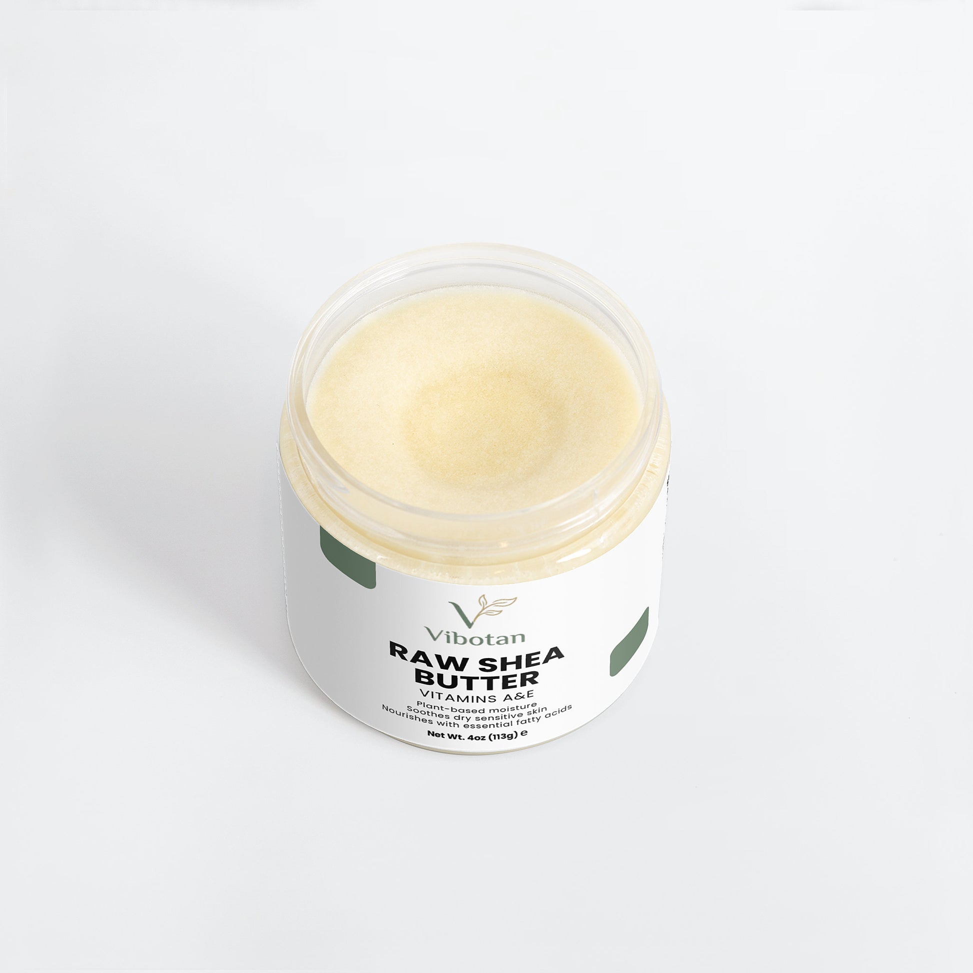Jar of Vibotan Raw Shea Butter on a white background