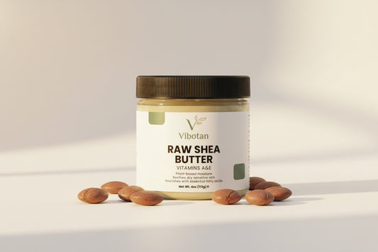 Jar of Vibotan raw shea butter on a white background